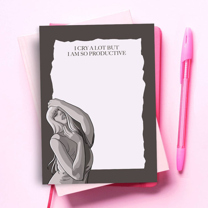 So Productive Notepad, a notepad with a brown grey border and an illustration of Taylor Swift with the words 