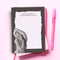 So Productive Notepad, a notepad with a brown grey border and an illustration of Taylor Swift with the words 