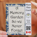 Card with floral design and text 'A Memory Garden So we Never Forget' held by a person.