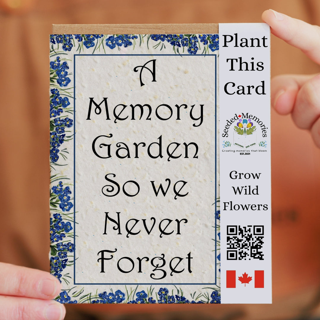 Card with floral design and text 'A Memory Garden So we Never Forget' held by a person.