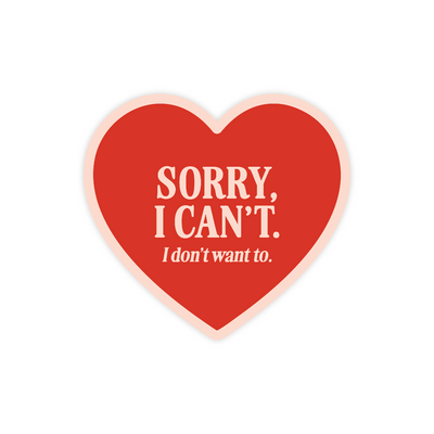 Red heart-shaped sticker with white text on a white background