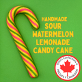 Handmade sour watermelon lemonade candy cane with Volto's Confections branding on a green background
