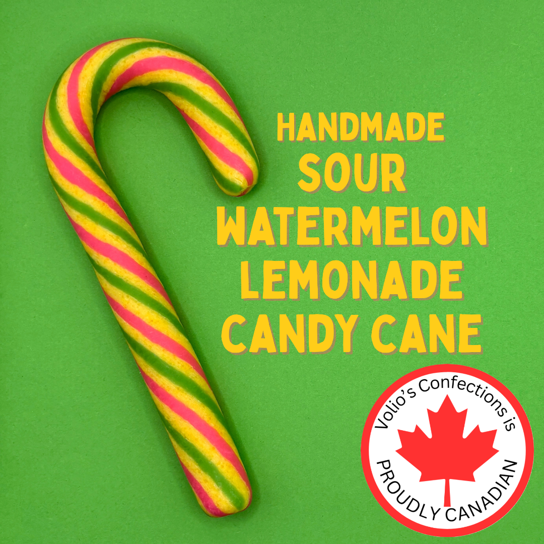 Handmade sour watermelon lemonade candy cane with Volto's Confections branding on a green background