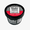 A jar of Undercarriage Spicy Cool Natural Deodorant with a black lid and red and white label.