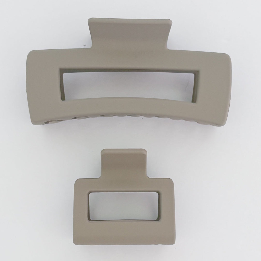 Two beige rectangular objects on a white background