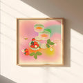 Framed artwork of a colorful floral design on a wall with soft lighting