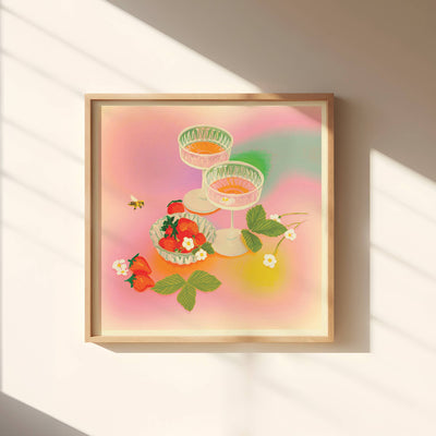 Framed artwork of a colorful floral design on a wall with soft lighting