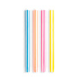 Set of colorful candles on a white background