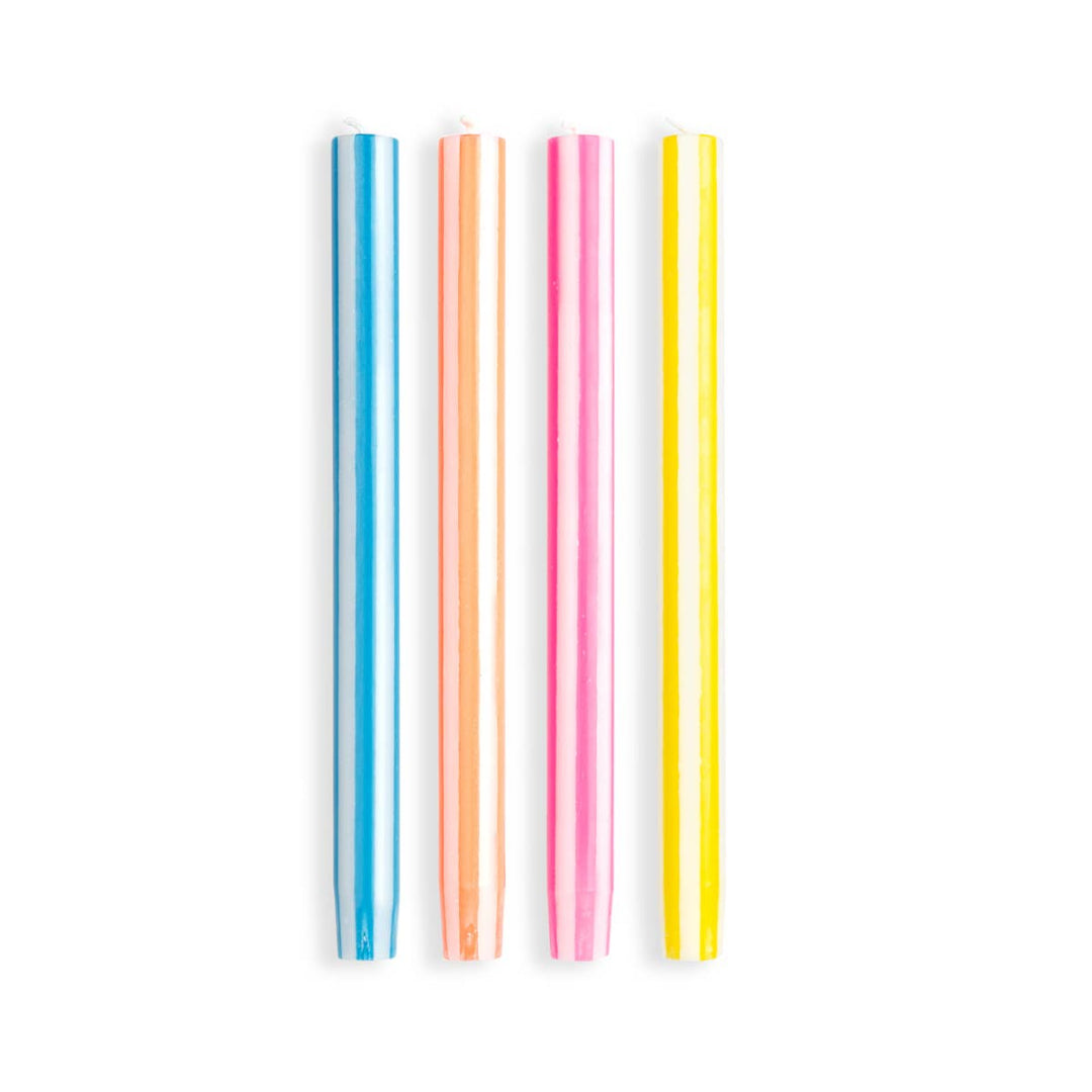 Set of colorful candles on a white background