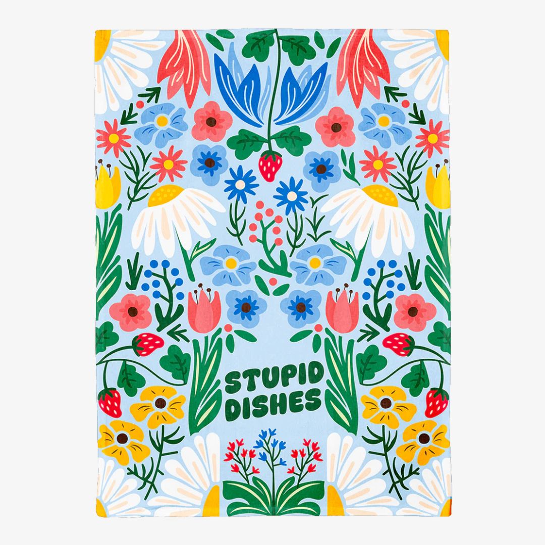 Colorful floral patterned towel with 'STUPID DISHES' text on a white background