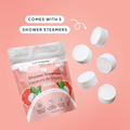 Pack of Naturebee shower steamers with individual steamers on a pink background