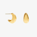 Gold hoop earrings on a white background