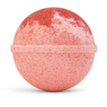 Pink bath bomb on a white background