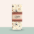 Terrazzo patterned product packaging with 'Goldylocks' branding on a light green background