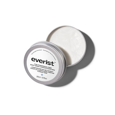 A small, open, silver metal tin of Everist's 
