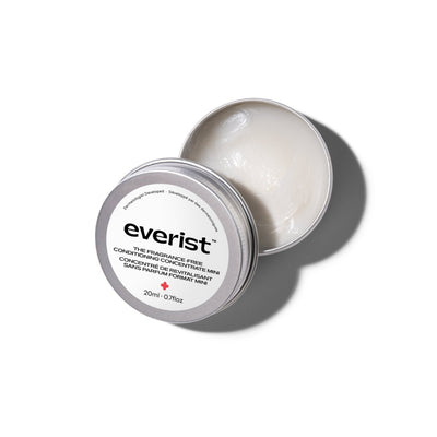 A small, open, silver metal tin of Everist's 