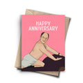 A pink 'Happy Anniversary' greeting card featuring a cartoon illustration of a bald man in white briefs sitting on a dark chair, shown with a brown envelope on a white background.