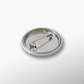 Silver brooch on a white background