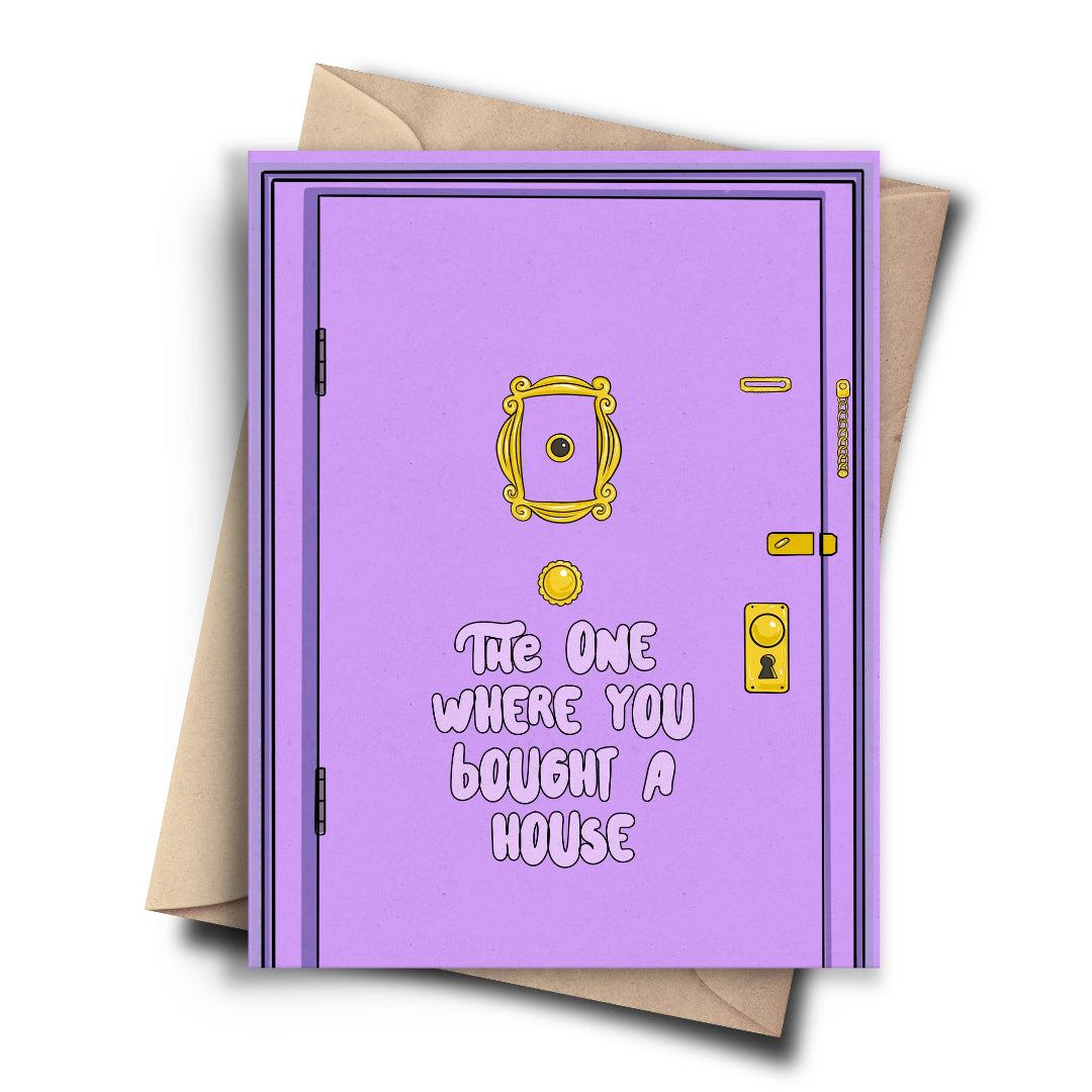 A purple greeting card designed to look like a door with the text 'THE ONE WHERE YOU BOUGHT A HOUSE' in white bubble letters, shown with a brown envelope on a white background.