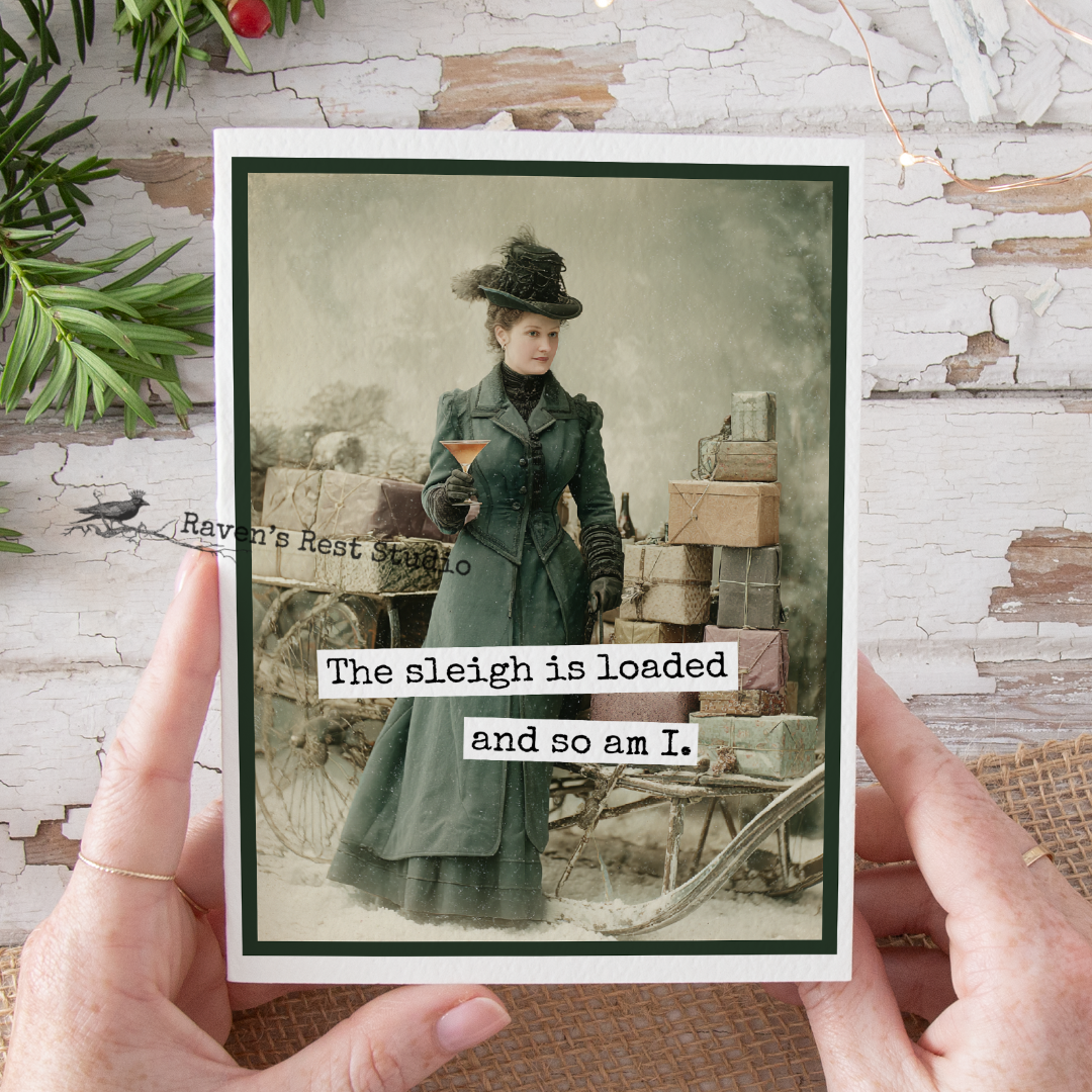 Person holding a framed vintage-style photo of a woman in a green coat with text overlay.