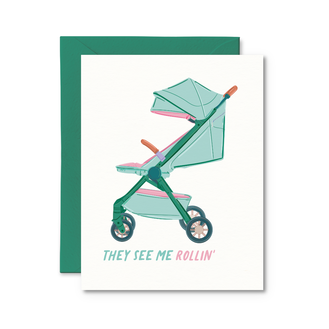 Card with a green stroller illustration and text 'They see me rollin'' on a white background.