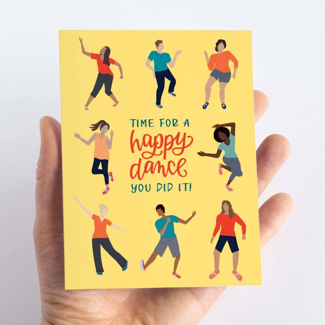 A card with a yellow background featuring seven people of different ages and races dancing. The text "TIME FOR A HAPPY DANCE YOU DID IT!" is written in bold letters below the figures.