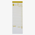 A tall, yellow and white notepad with a "TO DO LIST" heading and checkboxes next to blank lines. The top right has a checked box next to "wake up". Scissors are printed near the bottom, indicating a tear-off section for notes.