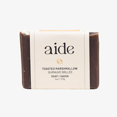 Bar of soap with 'aide' branding on a white background