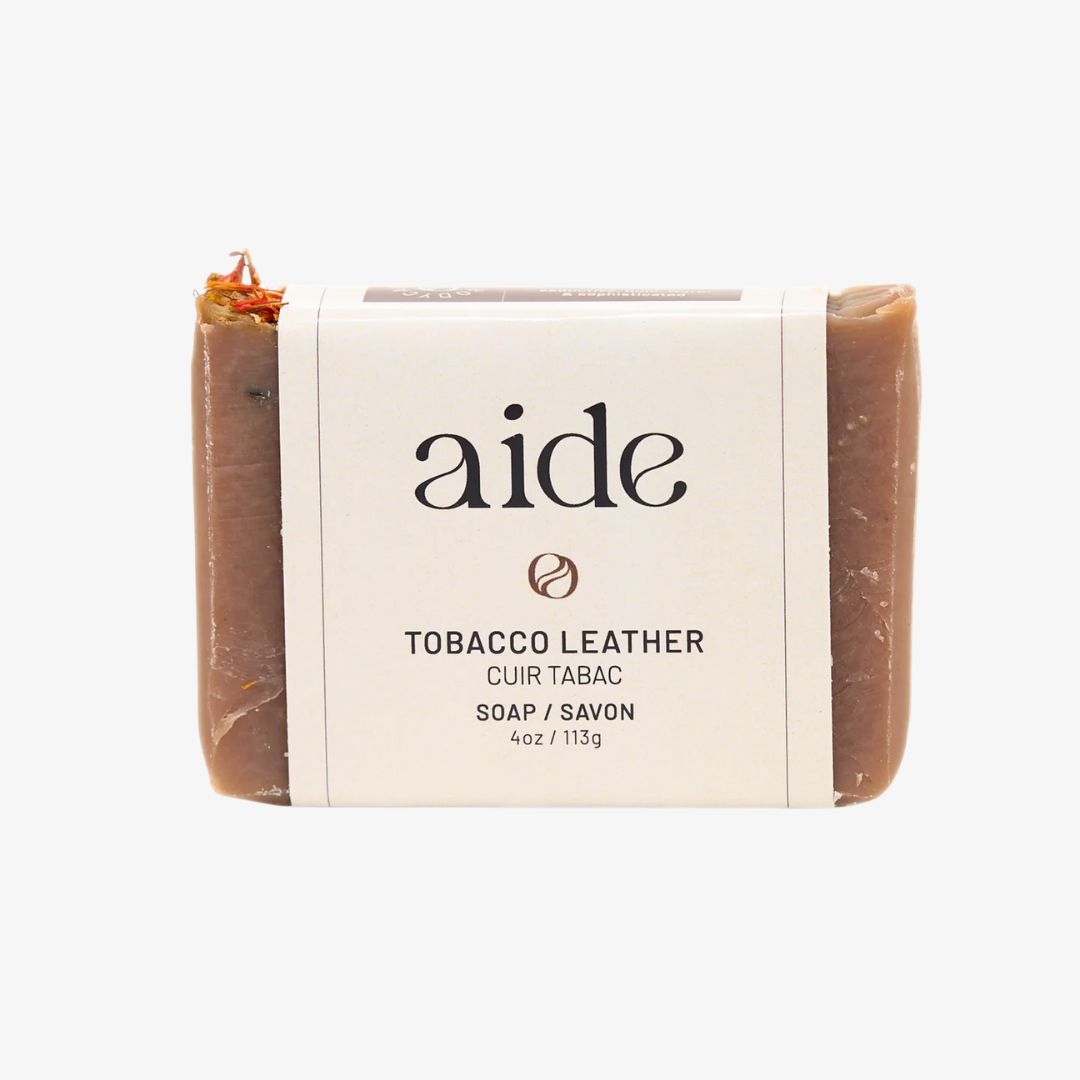 Bar of soap with 'aide' branding on a white background