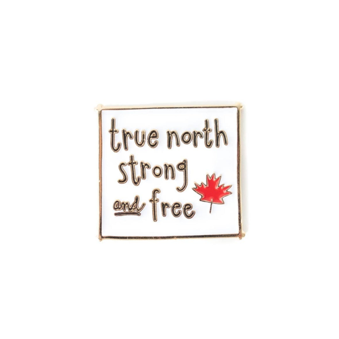 Pin with 'true north strong and free' text and a red maple leaf on a white background