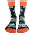 Frog-themed socks with orange accents on a white background