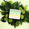Green flowers with a square card featuring a gradient design and 'Soda So Co' text.
