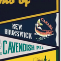 A vintage-style art print featuring a collection of colorful pennants representing various Canadian provinces, cities (including Ottawa, Montreal, Calgary), and landmarks (Banff, Green Gables, Algonquin Park). This nostalgic Canadian souvenir art is relevant to those in Ottawa, Ontario, Canada.