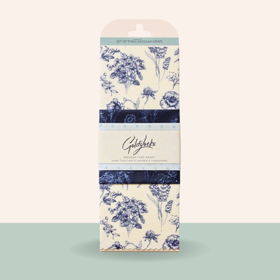 Packaging of Goldylocks beeswax wraps with floral design on a white background