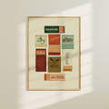 Framed artwork with various matchbox designs on a white wall