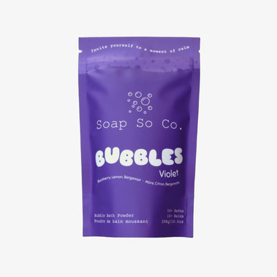 Purple packaging of Soap So Co. Bubbles Violet on a black background