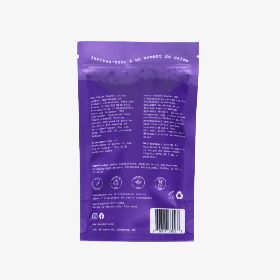 Purple packaging with text and symbols on a black background