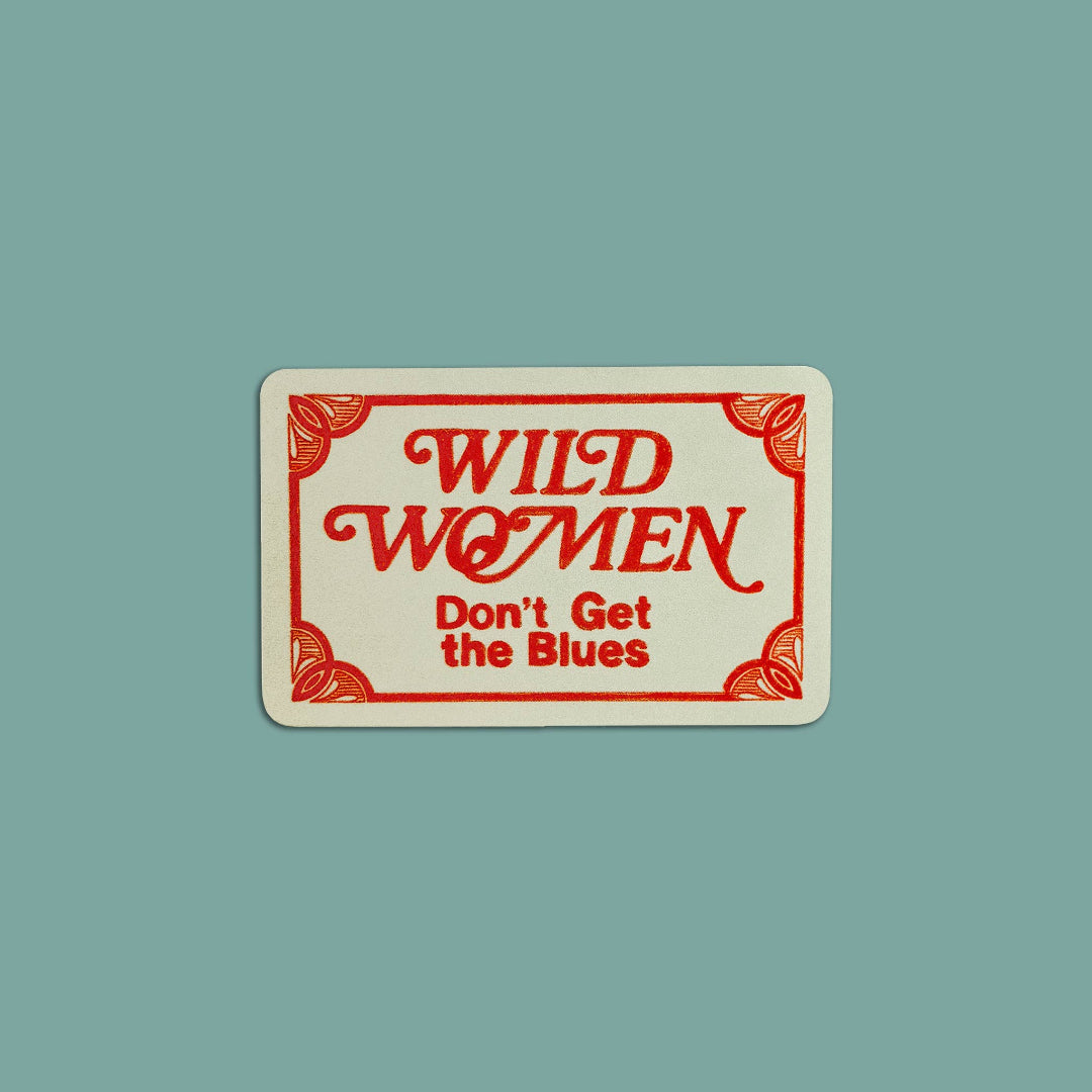 Rectangular sign with 'Wild Women Don't Get the Blues' text on a light blue background