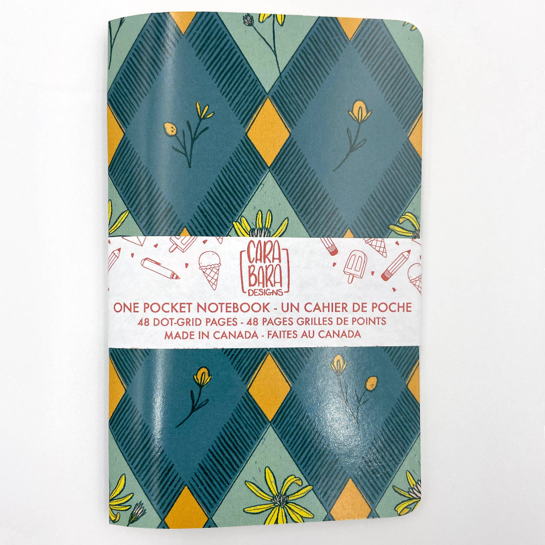 Pocket notebook with geometric pattern and branding on a white background