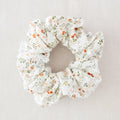 Floral scrunchie on a light gray background