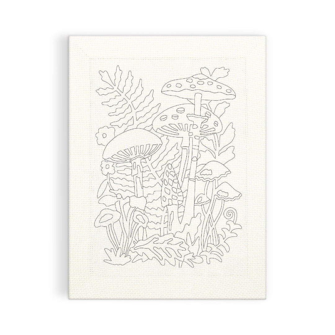 A vertical canvas art print featuring a delicate black line drawing of mushrooms and botanical elements on a textured off-white background, shown against a clean white studio backdrop.