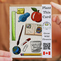 Seeded paper card with teacher-themed illustrations and QR code on a brown background
