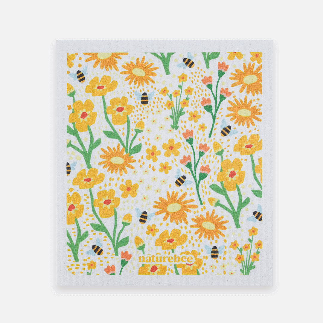 Reusable paper towel with yellow flowers and bees pattern on a white background