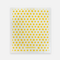 White towel with yellow floral pattern and 'naturebee' branding on a white background