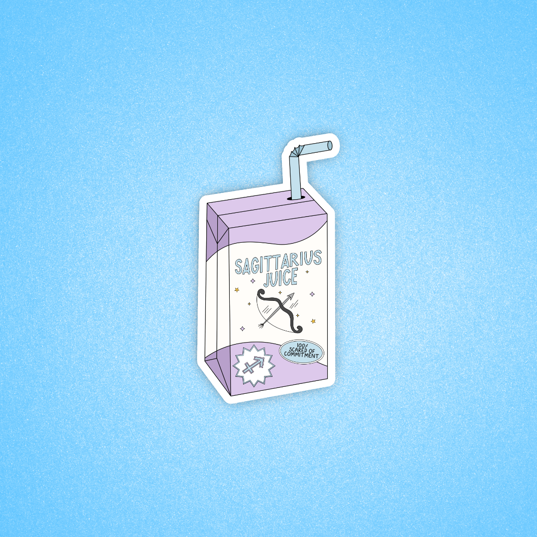 A die-cut sticker shaped like a milk carton labeled 'SAGITTARIUS JUICE' with a straw, shown on a light blue textured background. The carton is lavender and white with a black arrow graphic and small decorative stars.