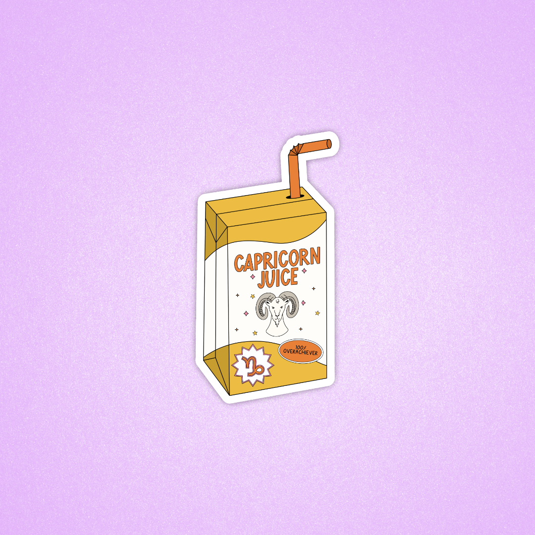 A die-cut sticker of a Capricorn juice carton on a light purple background. The carton is yellow and white with an orange straw and features a ram illustration and the text 'CAPRICORN JUICE'.