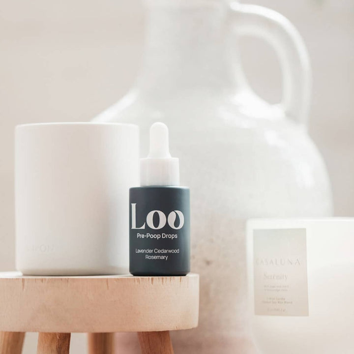 Lavender Cedarwood Rosemary Pre-Poop Toilet Drops, a toilet air freshener in a convenient dropper bottle.