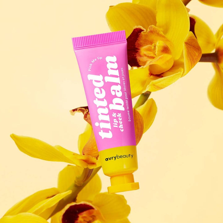 Pink Me Up Lip & Cheek Tinted Balm, a liquid blush that can be used for your eyes, cheeks and lips, in a colourful squeeze tube.