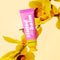 Pink Me Up Lip & Cheek Tinted Balm, a liquid blush that can be used for your eyes, cheeks and lips, in a colourful squeeze tube.