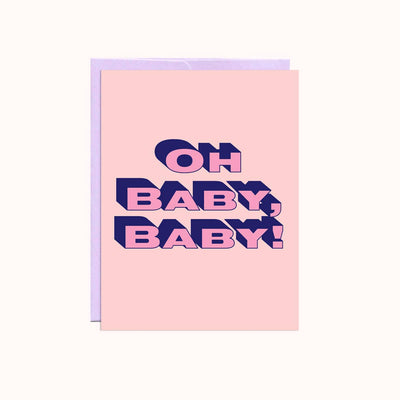 A pink greeting card with a light purple envelope. The card features the text 